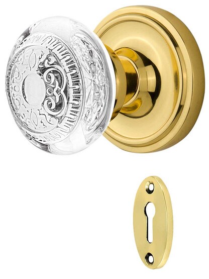 Classic Rosette Mortise-Lock Set with Egg and Dart Crystal-Glass Knobs in Polished Brass.